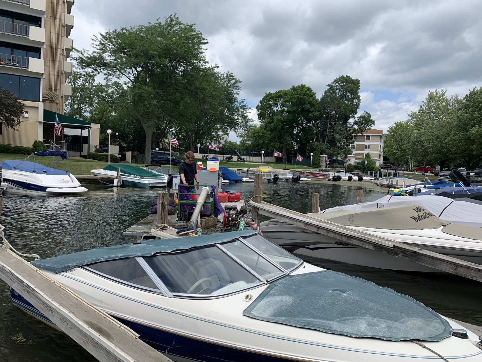 Crews from Rise Aquatics LLC work to remove debris from Lake Geneva's city lagoon